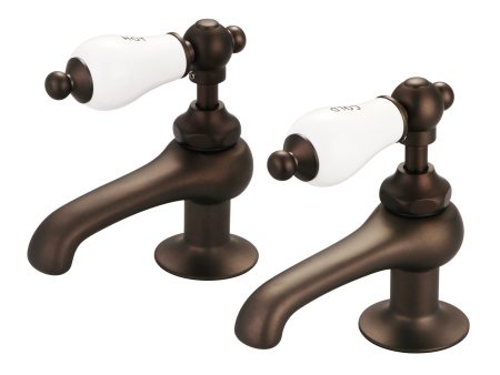 Water Creation | Vintage Classic Basin Cocks Lavatory Faucets in Oil-rubbed Bronze Finish Finish With Porcelain Lever Handles, Hot And Cold Labels Included | F1-0003-03-CL For Sale